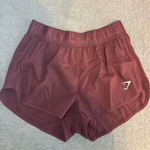 Gymshark running shorts size small plum color